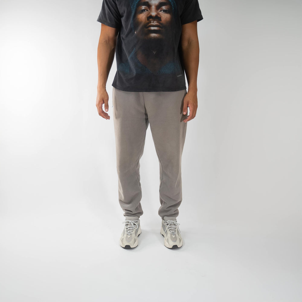 Light Gray Premium Jogger worn by model with black T-shirt and white sneakers.