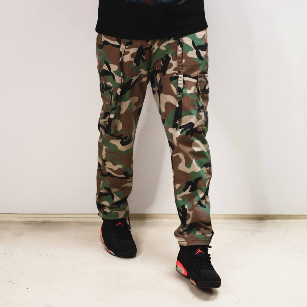 Camo trousers with a classic camouflage pattern.