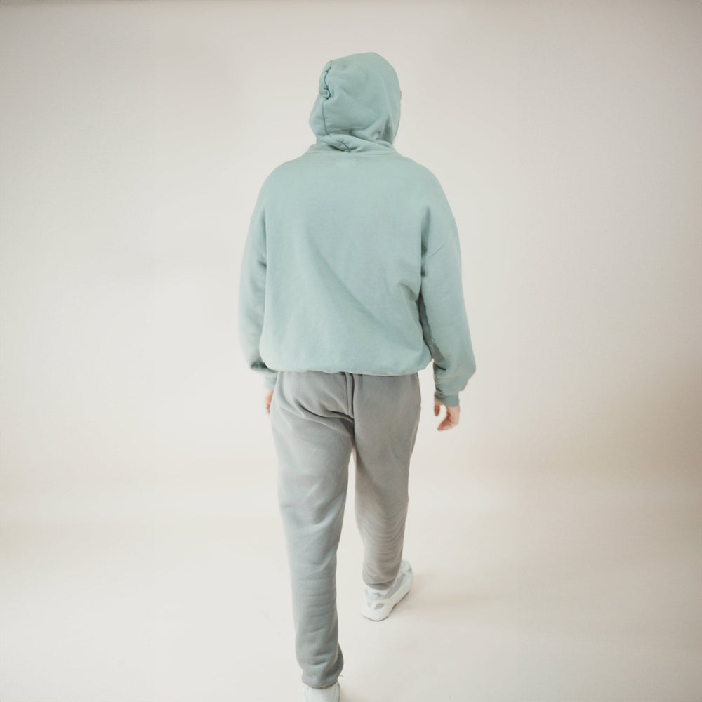 Aqua Round Hoodie in soft fabric, back view.