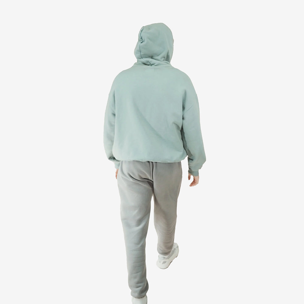 Aqua Round Hoodie worn by person from the back.