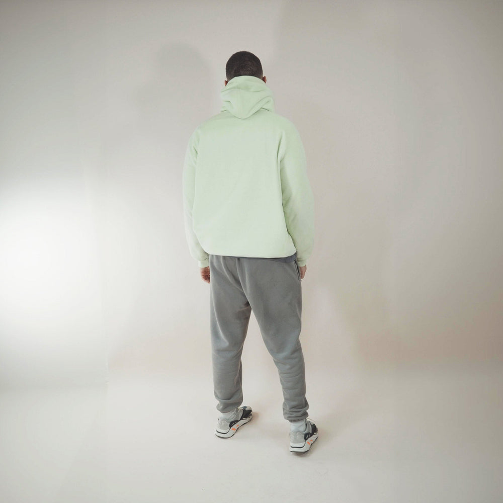 Person wearing a cozy fleece lined hoodie.