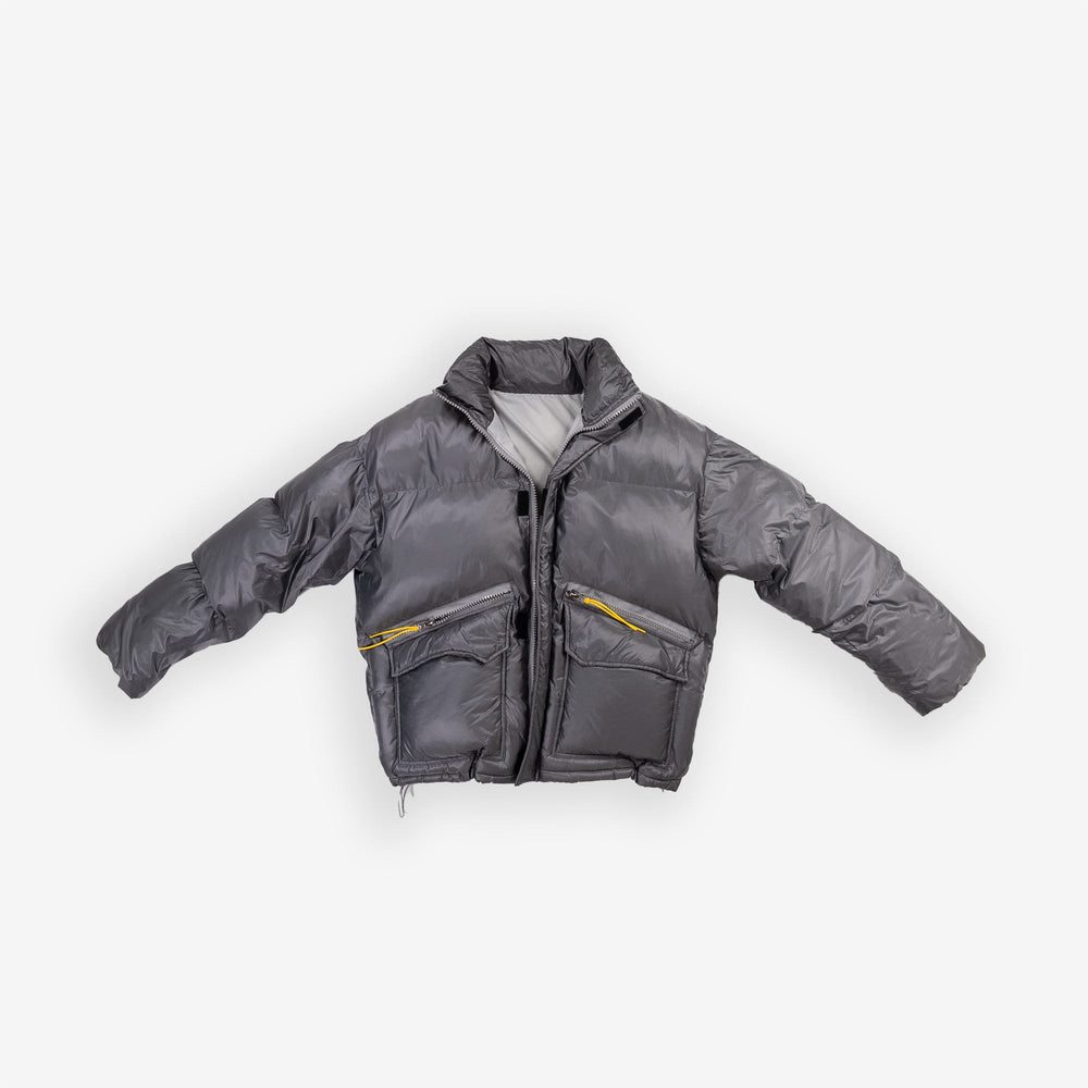 Gray padded round jacket with front pockets.