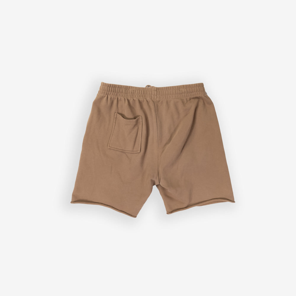 Camel shorts with elastic waistband and back pocket on a plain background.