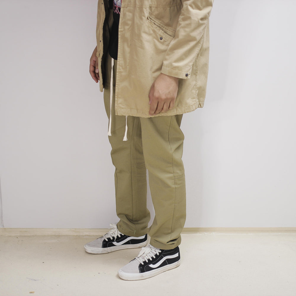 Khaki drawstring trouser with casual fit.