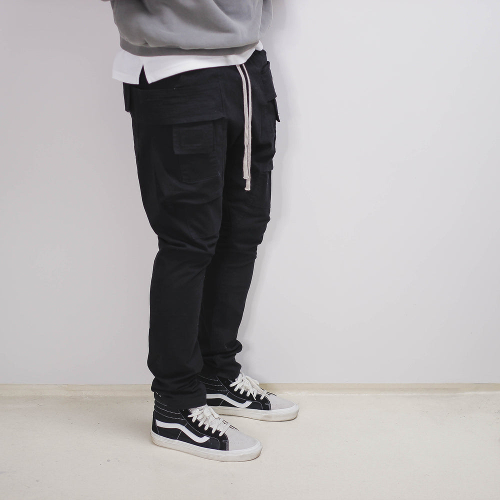 Black slim cargo pant with side pockets.