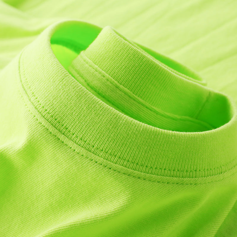 Limn Green Tee close-up detail.
