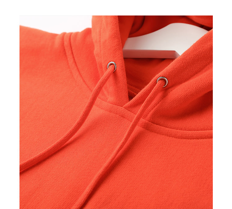 Bright red Infrared Hoodie with drawstrings and a soft texture.