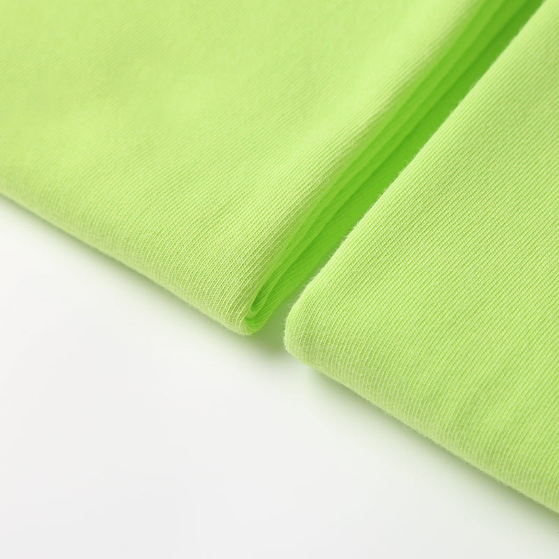 Close-up of Limn Green Tee fabric.