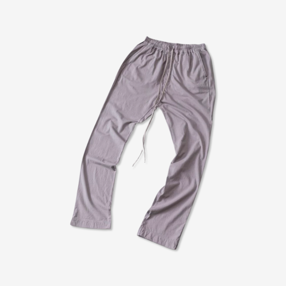 Grey drawstring pant on white background.