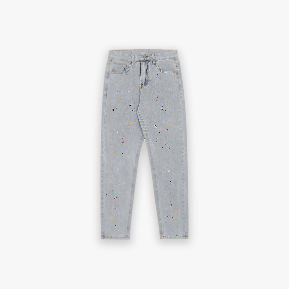 Light-blue denim pants with paint splatter design, offering a distressed, laid-back look.