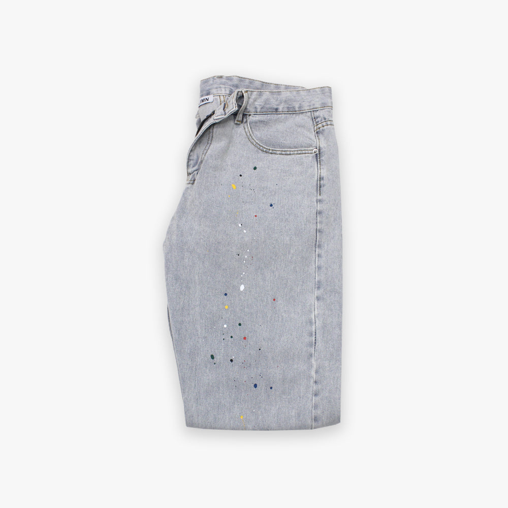 Light-blue denim jeans with paint splatter design for a distressed, laid-back look.