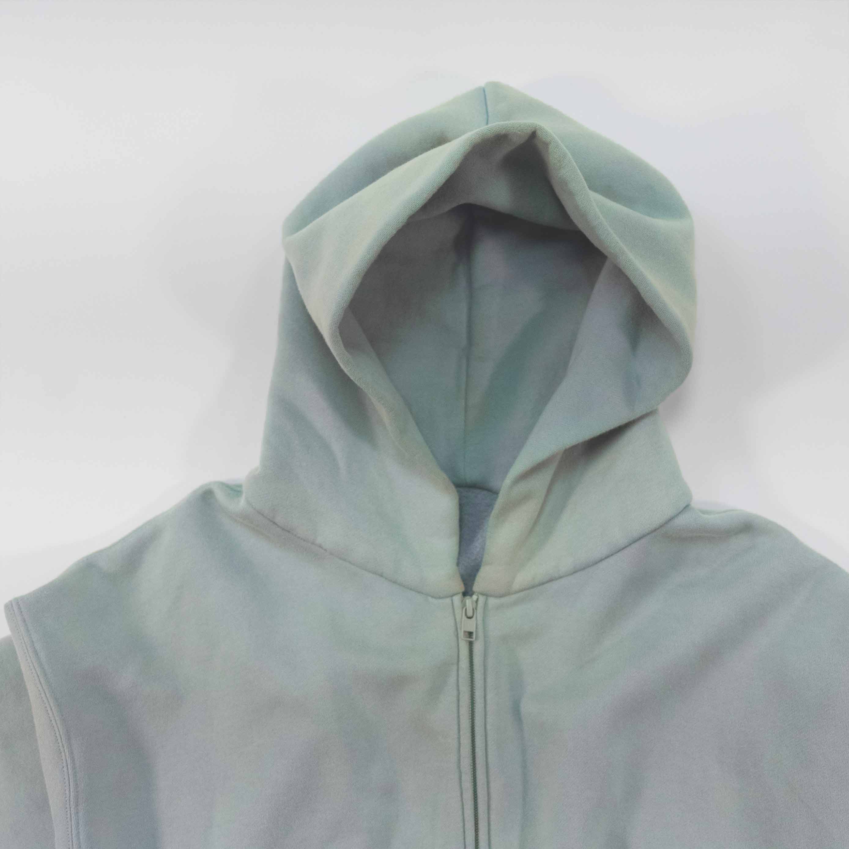 Aqua zip-up hoodie with hood and front zipper.