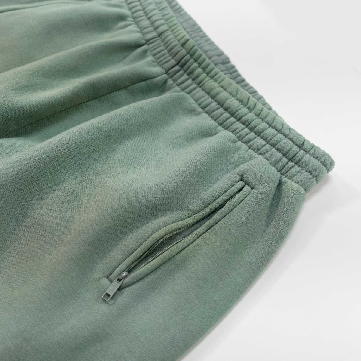 Aqua Premium Jogger Pants with elastic waistband and side zipper pocket.