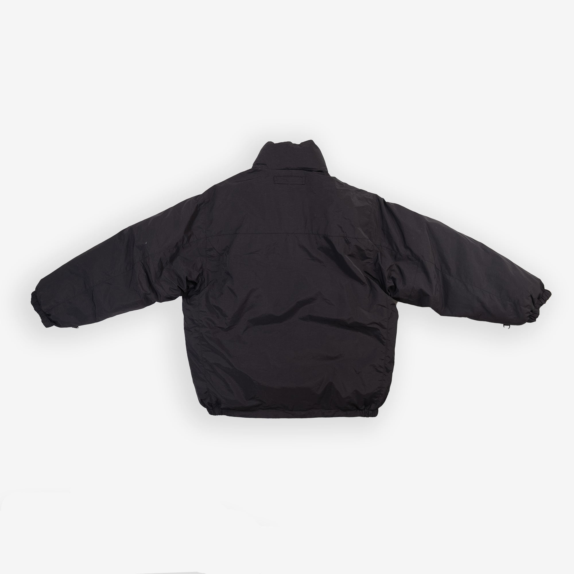 Black flight jacket with a high collar and long sleeves.