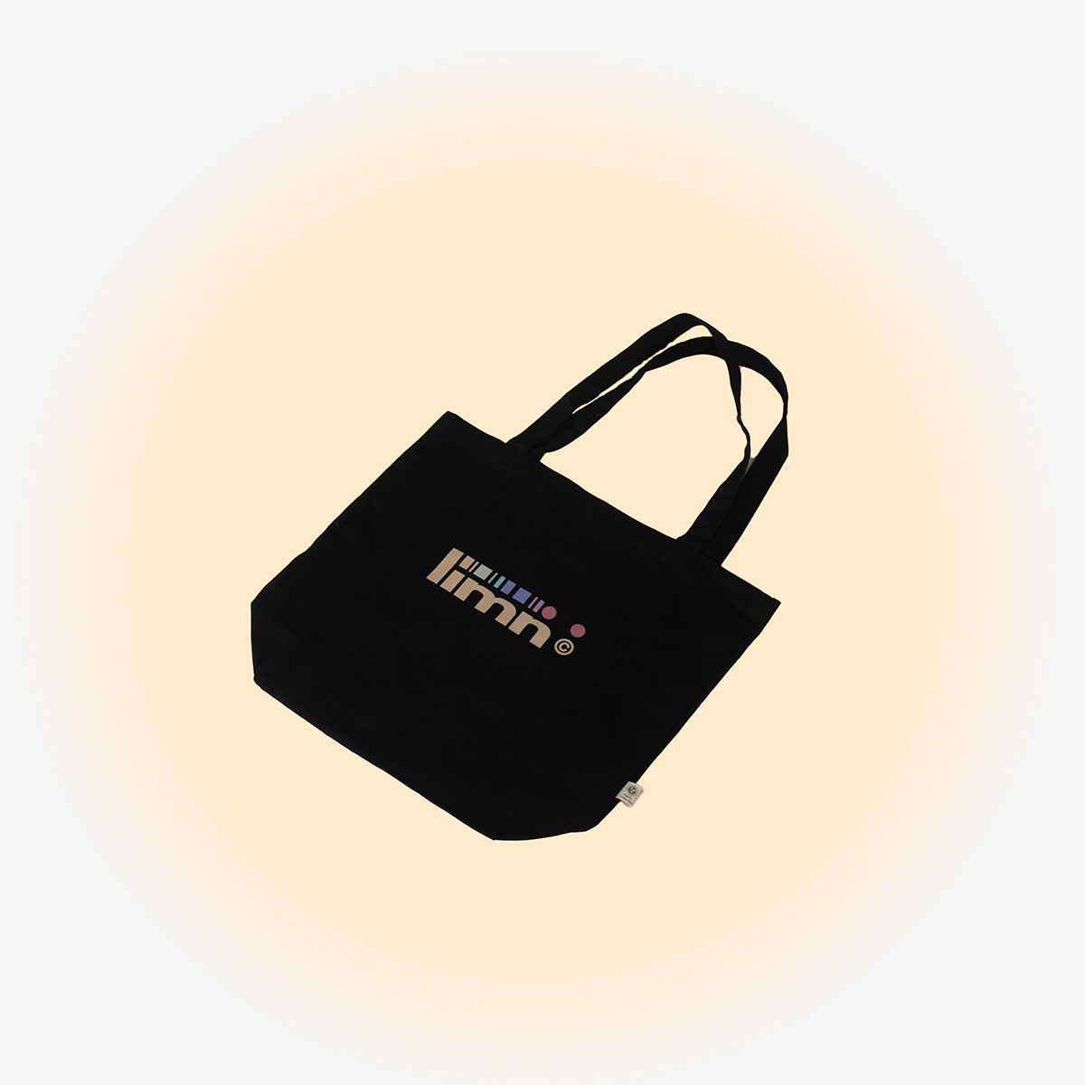 Black Limn Mini Tote Bag on a light background