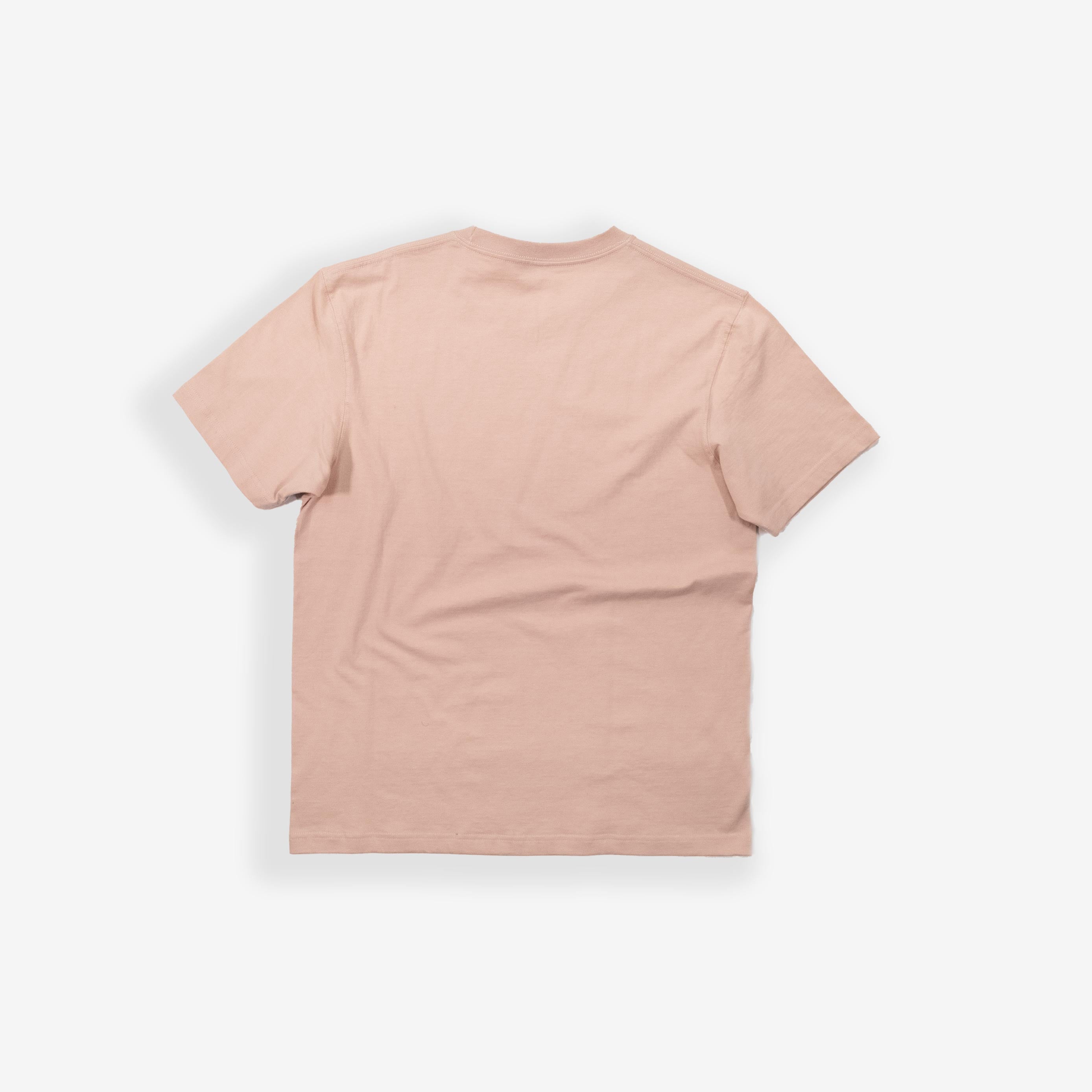 Peach Winter Tee laying flat on a white background.