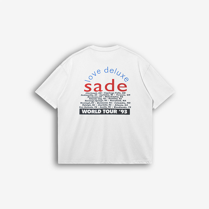 Back view of the Sade World Tour Tee, showcasing tour locations with bold red and blue typography