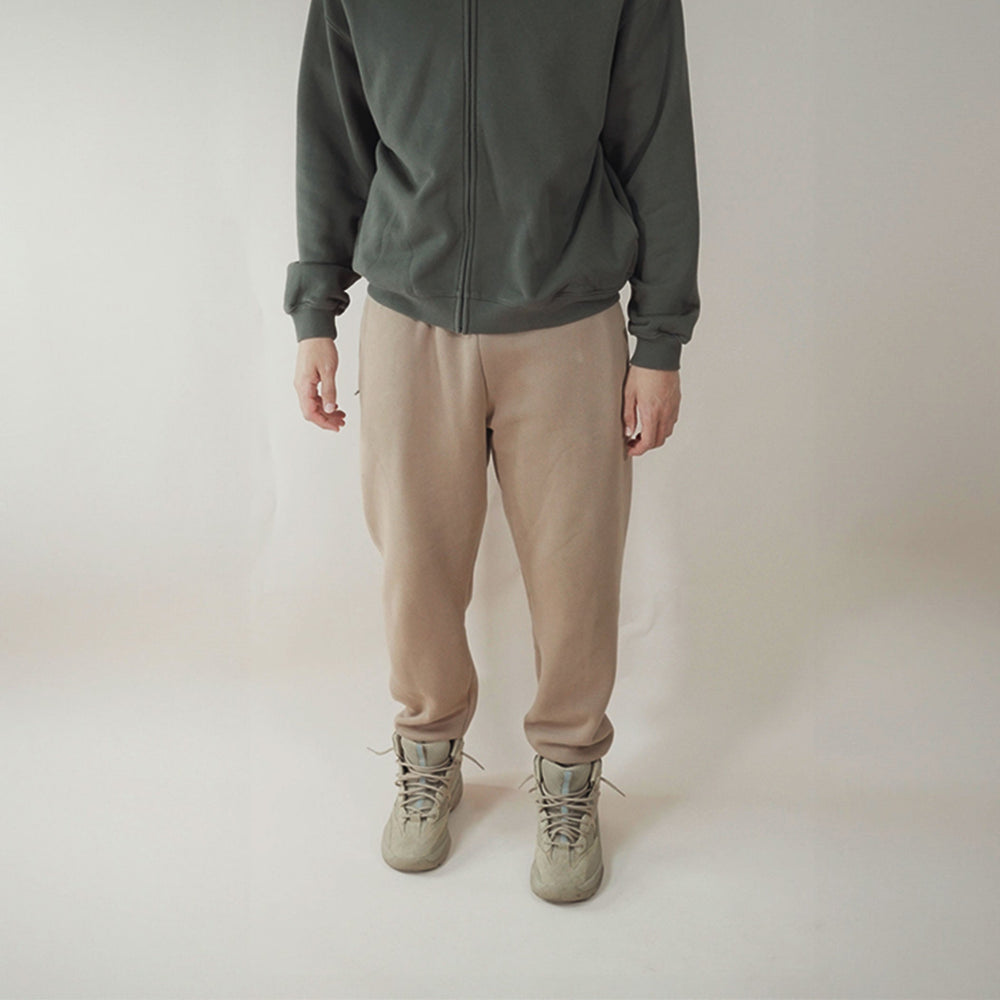 Tan premium joggers with a relaxed fit.