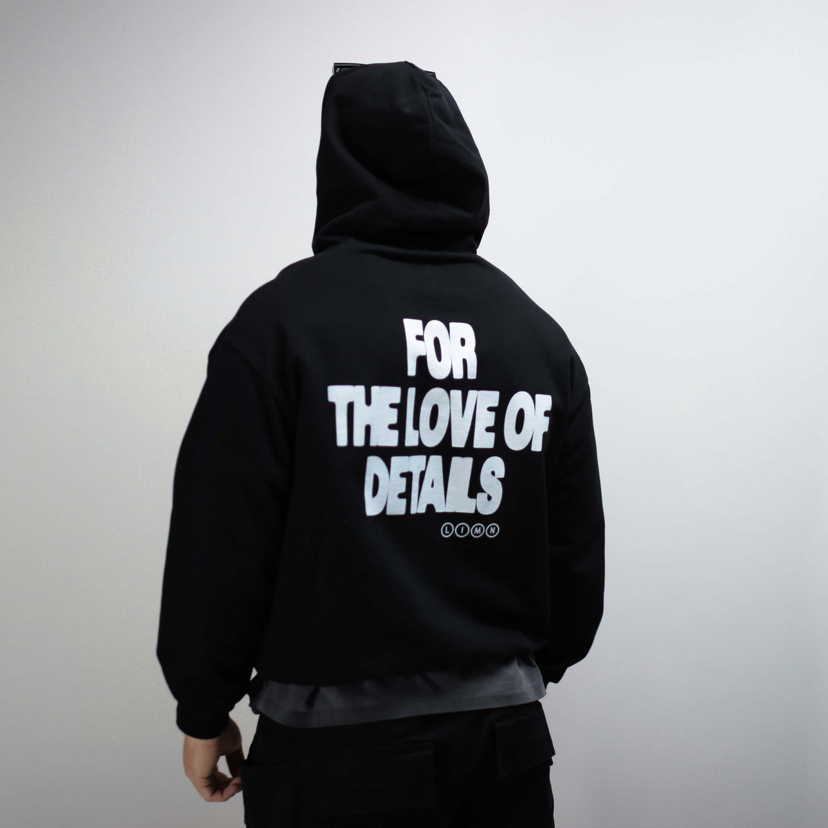 Back view of the For the Love of Details Hoodie in black.