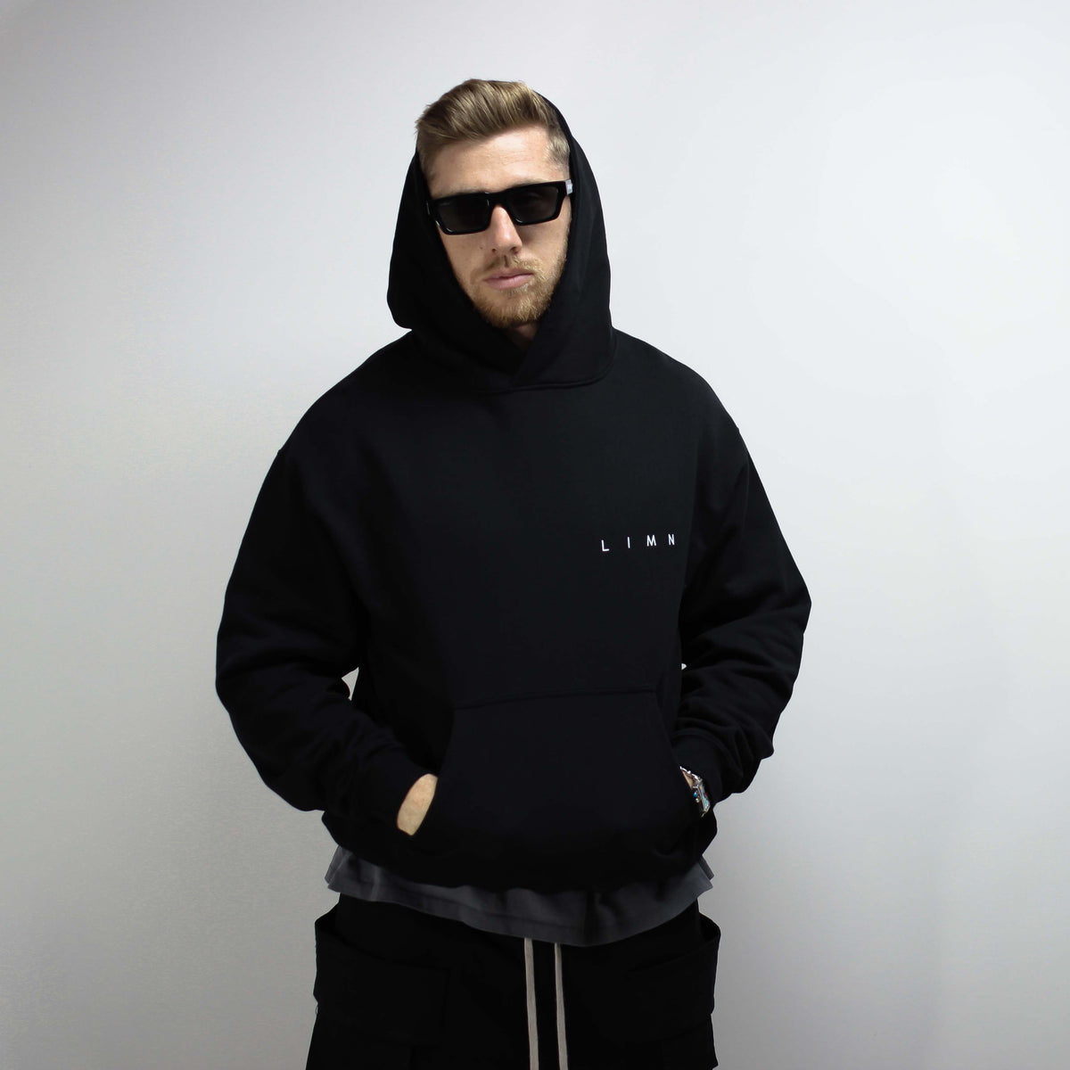 Black Details Hoodie with minimalist design.