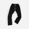 cotton black draw string pant laid on white background