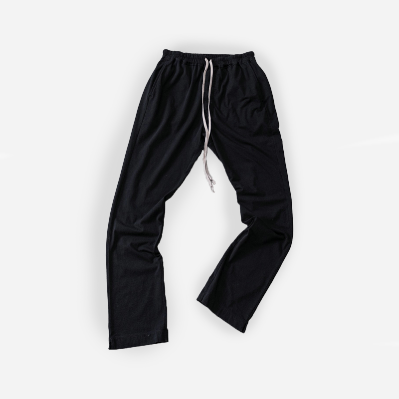 Black drawstring pant on a white background.