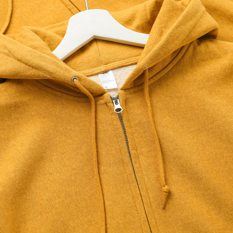 Amber zip-up hoodie on hanger.