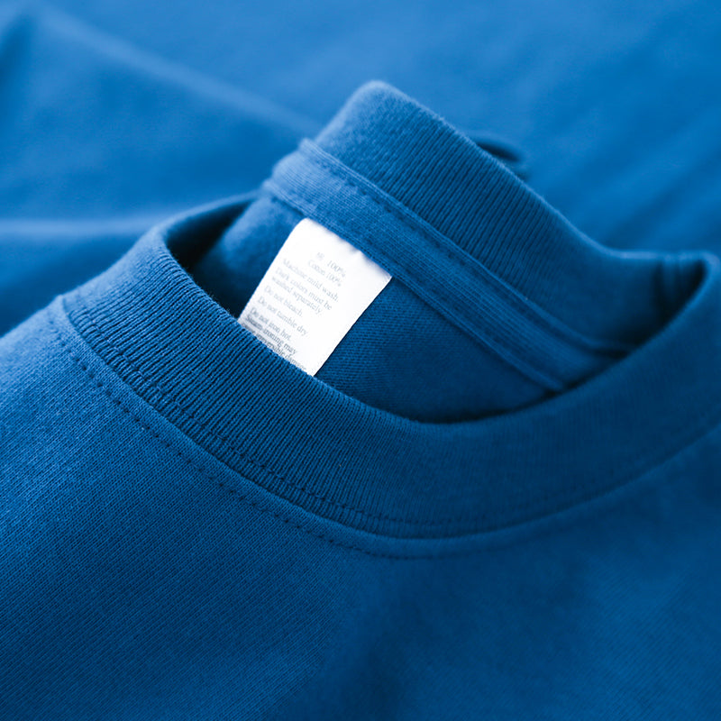 Sapphire Blue Winter Tee folded neatly showing label.