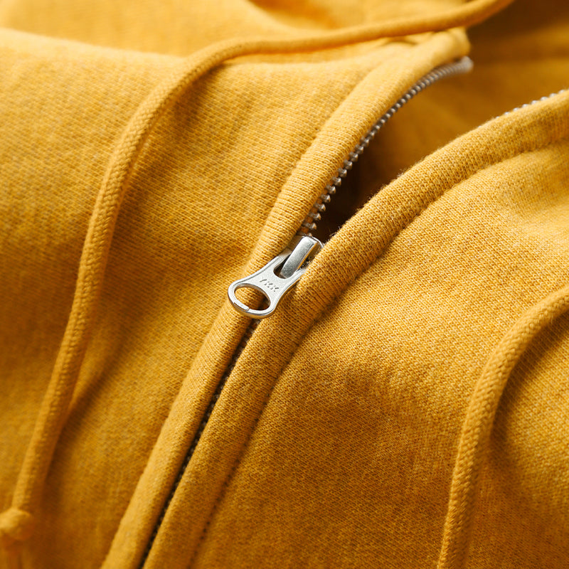 Amber Zip-Up Hoodie with detailed zipper view.