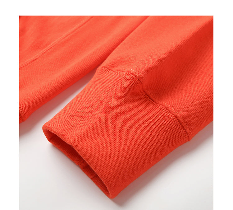 Close-up of orange infrared hoodie sleeve.