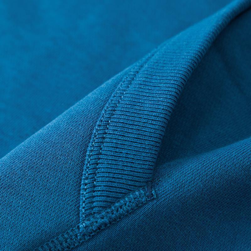 Close-up of Sapphire Blue hoodie fabric detail.