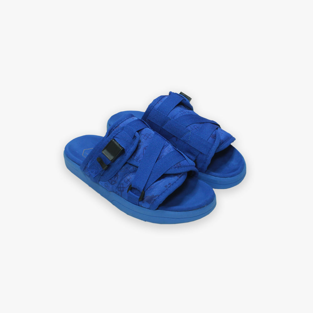 Cobalt Blue Slides featuring adjustable straps.