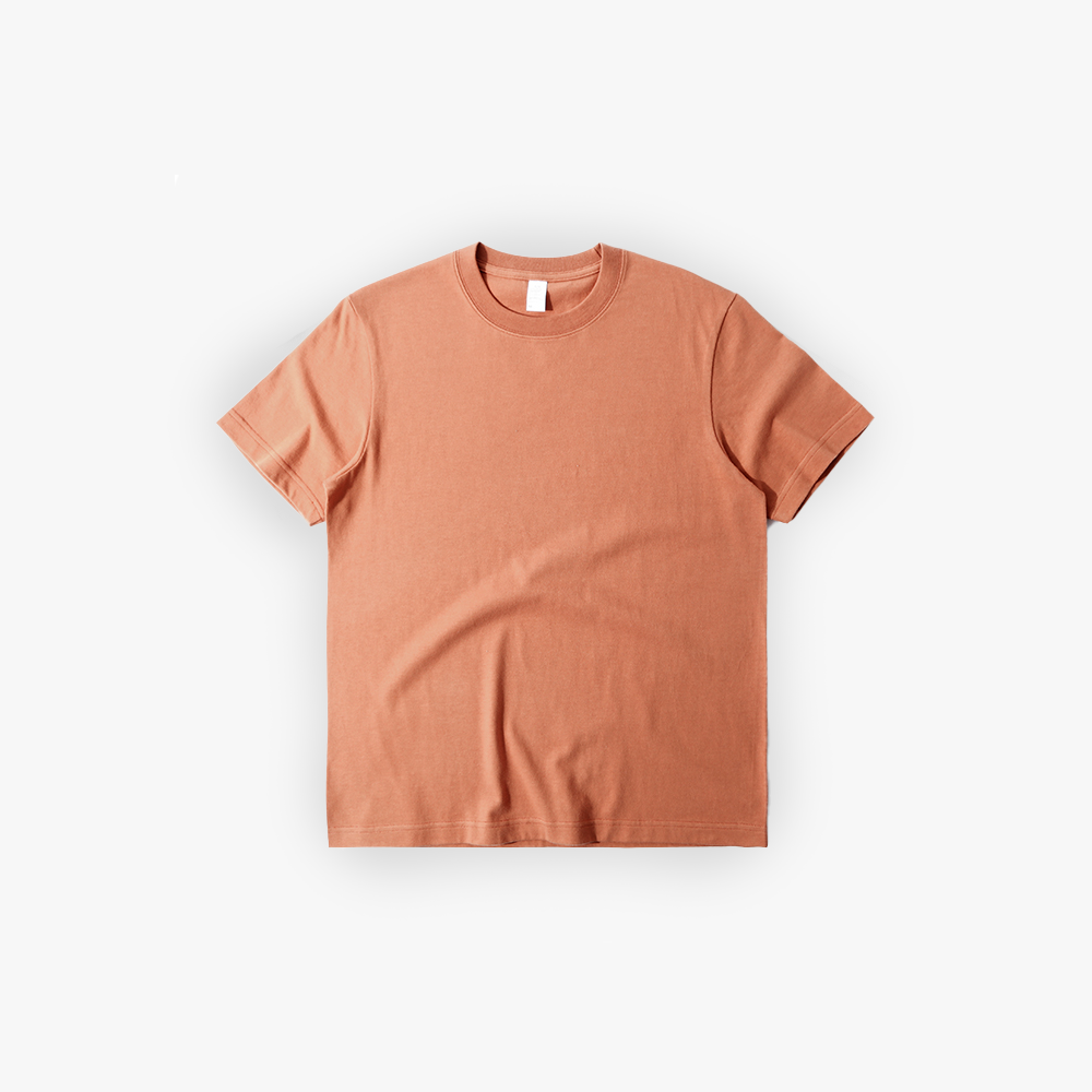 Rust-colored t-shirt on white background.